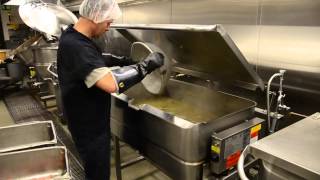 Inmates prepare food for meals at the clark county jail and work
center.