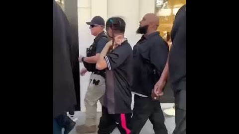 6ix9ine out there with his security guards walking in California