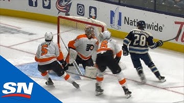 Oliver Bjorkstrand Scores And Gets Puck Stuck Above The Water Bottle