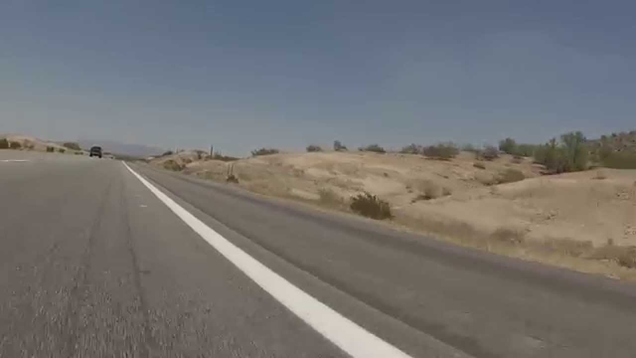 Drive on AZ State Route 85 Highway to Interstate 10 Freeway Entrance in Buckeye, AZ, GP040065