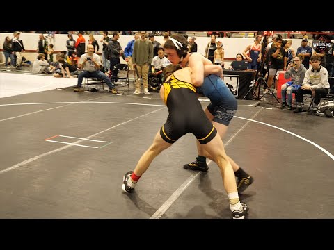 Kalab Hammer of Lakeland Wrestling [R] and Forrest Craddock of Goldman W.A.R. [G] (137)