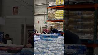 Playful Boy Attempts To Sleep on Water Bottles
