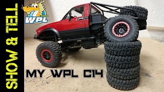 Showing off my custom built WPL C14 with rear cantilever suspension, hand made roll cage and more!