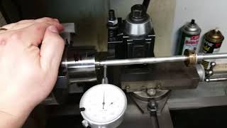 How to straigten a machined metal rod using a lathe without cutting