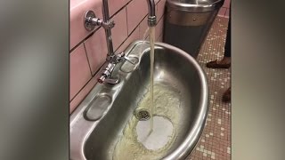 Student suspended for posting photo of discolored school water