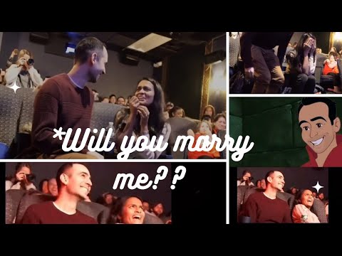 Man propose to his Girlfriend by reanimating the Sleeping Beauty film. Best proposal of all time.