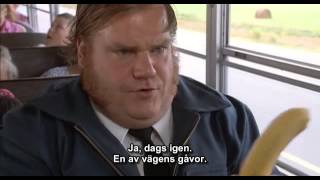 Chris Farley eats a banana