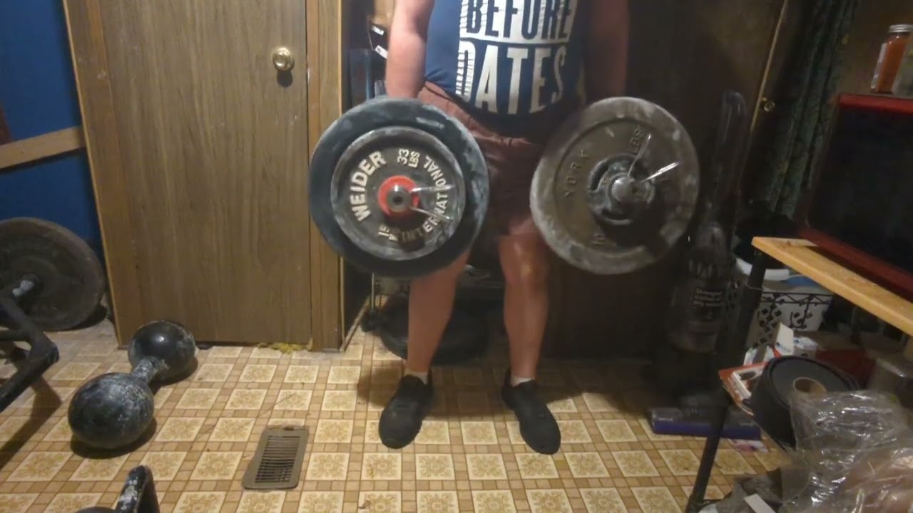 513.5 pound dumbbells deadlift