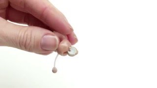 Turning on and inserting your Microphone-In-Helix hearing aid