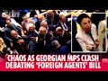 Chaos as Georgian MPs clash in parliament as they debate &#39;foreign agents&#39; bill