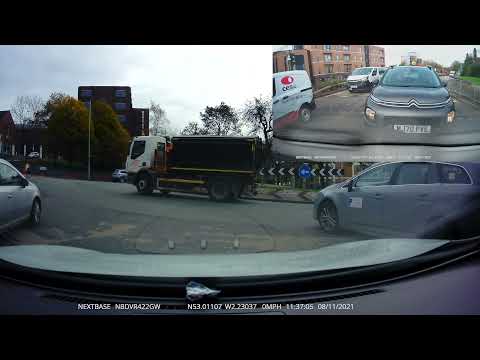 Designated left lane on a roundabout. The importance of mirrors.