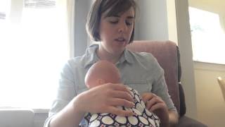 Watch this nursing cover turn into a burp cloth, bib, wearable blanket and smock!