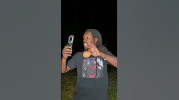 Python Cowboy Catches a Python with a Wild Raccoon on His Shoulder