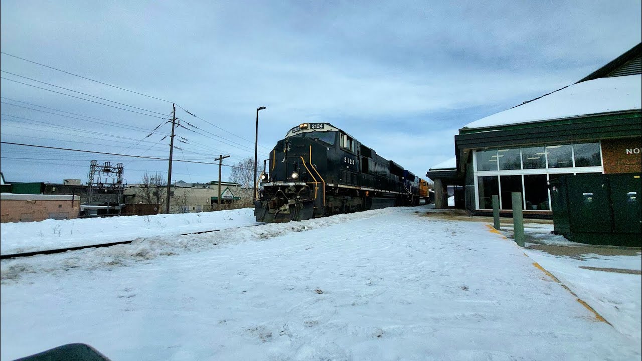ONR 214 arriving at the train station with units ONR 2124 leading, and ONR 2122 