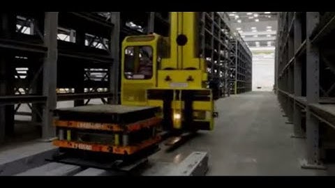 Overhead Stacker Crane Stores Molds Over Racks Across Multiple Aisles