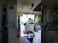 Transferring a person from a wheelchair into a vehicle using an electric lift 📌