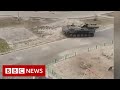 Russian tanks filmed entering Ukraine's capital Kyiv - BBC News