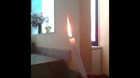 Reverse video of candle flame using a perfumes