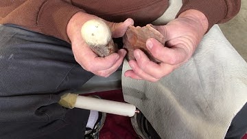Indirect percussion flint knapping on a piece of Flint Ridge 1/4