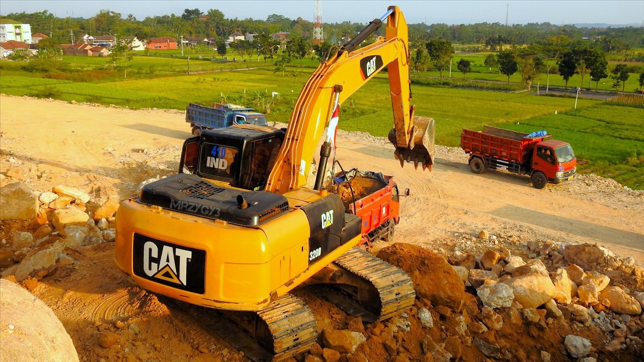 CAT 320D Excavator In Action : Loading Construction Material Into ...