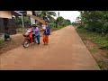 Rural life in Isan, Thailand. Morning ride around the village.