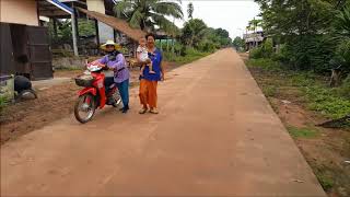 Rural life in Isan, Thailand. Morning ride around the village.