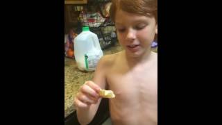 9 year old boy eats Carolina Reaper hot sauce