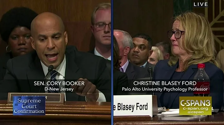 Cory Booker speaks to Christine Ford during Judge ...