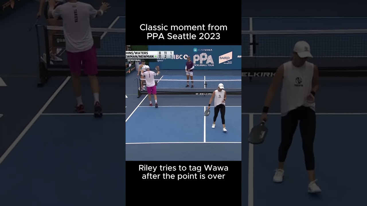 Riley Newman tries to hit Anna Leigh Waters after the point is over 