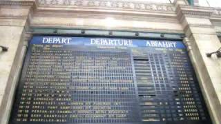 Train Station Departures Board Flipping Over