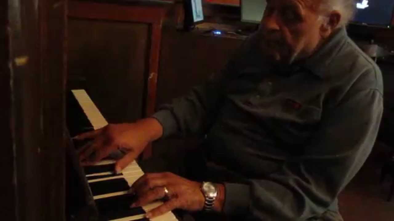 Clarence H Watson plays at the Belgian Cafe