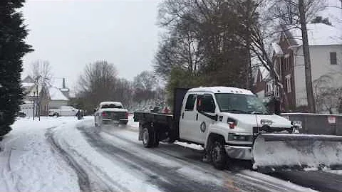 Ford pulls Chevy snow plow up hill