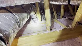 Home Inspector inspects an attic in Madisonville, LA