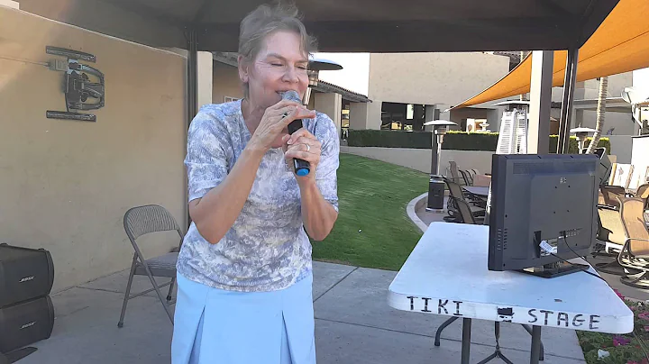 Beverly Levine sings karaoke