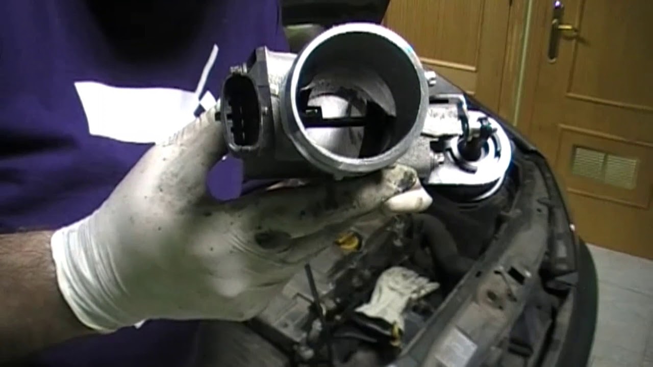 DESMONTAR EGR Y MARIPOSA DE ADMISION OPEL ZAFIRA 2.2 DTI 2004