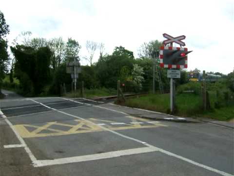 the train is coming from ipswich and going to lowestoft and is stopping at my local station. This crossing does not have barriers. Thank you for waching. This is the 12.05 service. your comments will appear once i have given them my approval.