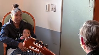 Denver Health Volunteer Provides Music Therapy for Children and Babies