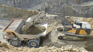 Is it cost efficient to load a 67 m³ capacity truck with a 6 m³ bucket VOLVO EC950El Loads a Truck