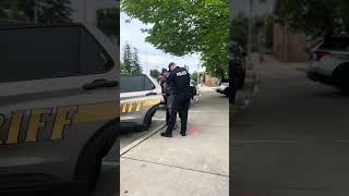Kirk Bangstad, Owner of the Minocqua Brewing Company, Being Arrested by the Oneida County Sheriff Profile