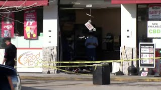 Pickup backs through front doors of Speedway store
