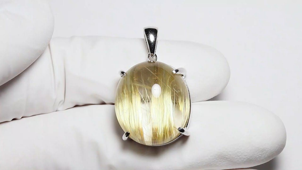 タイチンイエローゴールドルチルクォーツ オーバル・カボションカット