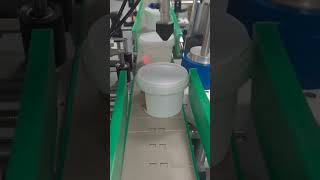 Automatic cone slight shape bucket bottle positioning labeling machine labeler video