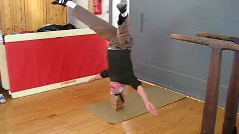 Claude Victoria head stand at 74 years of age