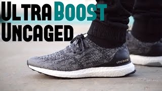 ultra boost uncaged black on feet