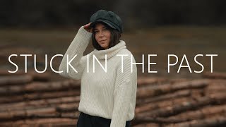 Skydrops & Deagon - Stuck In The Past (Lyrics) ft. Nino Lucarelli