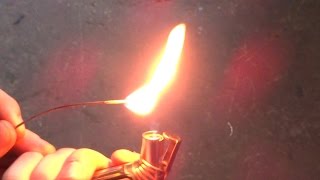 Lighting solid butane (or ice with butane bubbles trapped in it) on fire