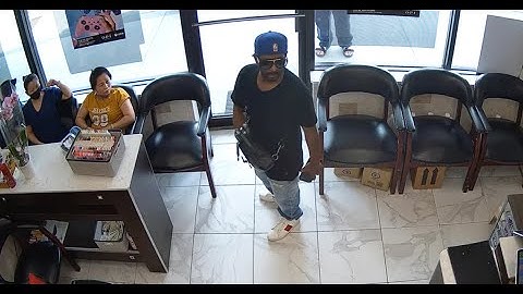 Video shows failed robbery attempt at nail salon as customers ignore would-be robber
