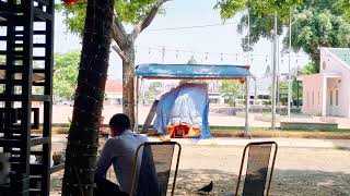 drinking coffee in a Vietnamese park