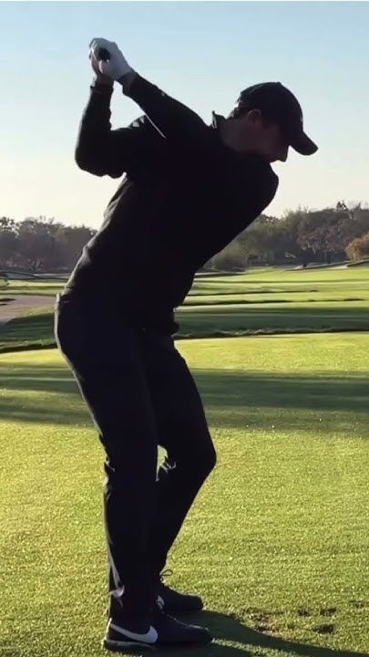 Slo Mo Golf Swing Down The Line Rory McIlroy long iron golf swing down the line. Full speed and slo