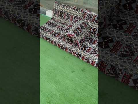 جلسة أرضية أنيقة بتصميم مريح مزودة بمسند مدمج للذراع